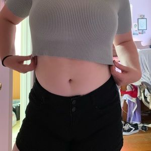 Black cuffed shorts with a double button